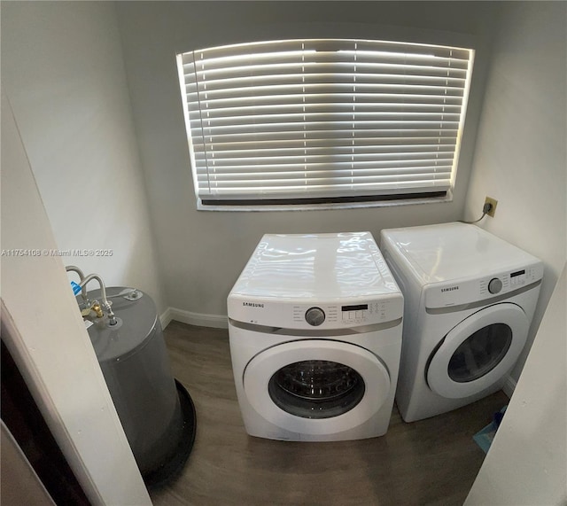 1640 NW 93rd Ave Unit 306, Pembroke Pines, FL 33024 - kitchen with a peninsula, baseboards, light stone counters, and a sink