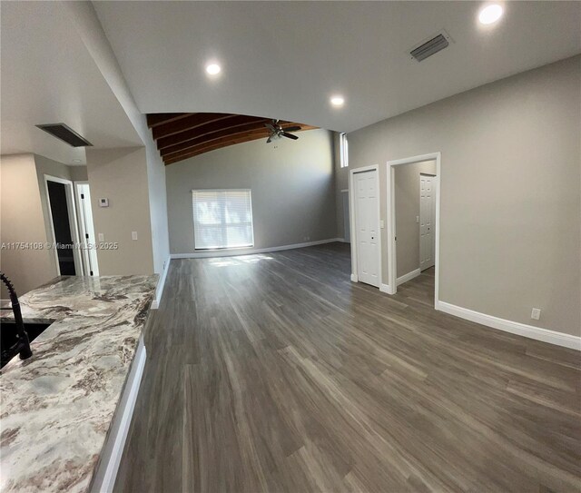 1640 NW 93rd Ave Unit 306, Pembroke Pines, FL 33024 - unfurnished living room with a ceiling fan, visible vents, beam ceiling, baseboards, and recessed lighting