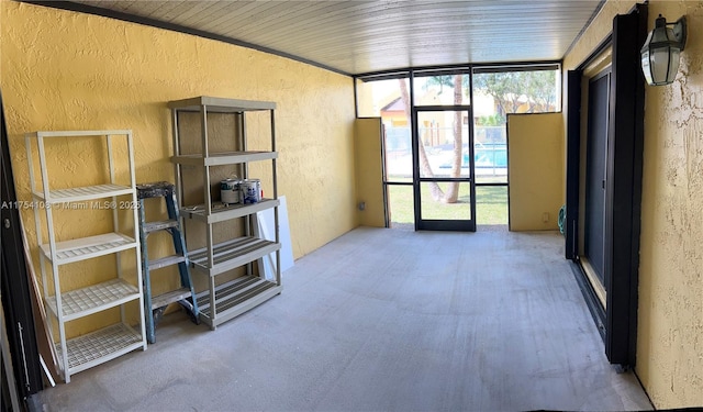 1640 NW 93rd Ave Unit 306, Pembroke Pines, FL 33024 - unfurnished room with baseboards and dark wood-type flooring