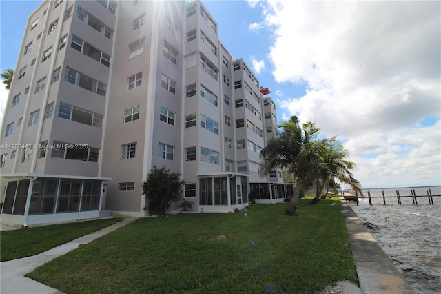 view of property with a water view