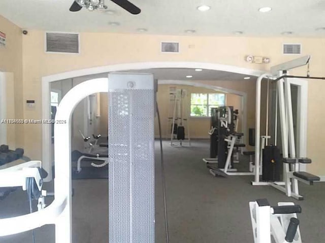 gym with ceiling fan, visible vents, and recessed lighting