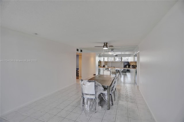 1524 Whitehall Dr Unit 102, Davie, FL 33324 - dining room featuring a ceiling fan and baseboards