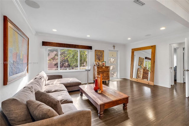 living area featuring visible vents, dark wood-type flooring, baseboards, ornamental molding, and recessed lighting