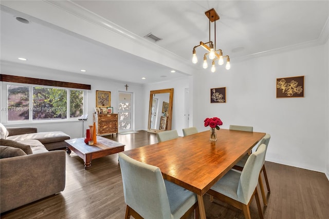 dining space with visible vents, crown molding, baseboards, recessed lighting, and wood finished floors