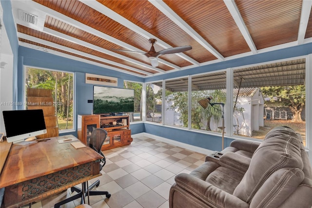 tiled office space featuring baseboards, visible vents, beam ceiling, a sunroom, and ceiling fan