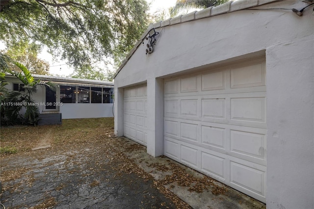 garage with driveway