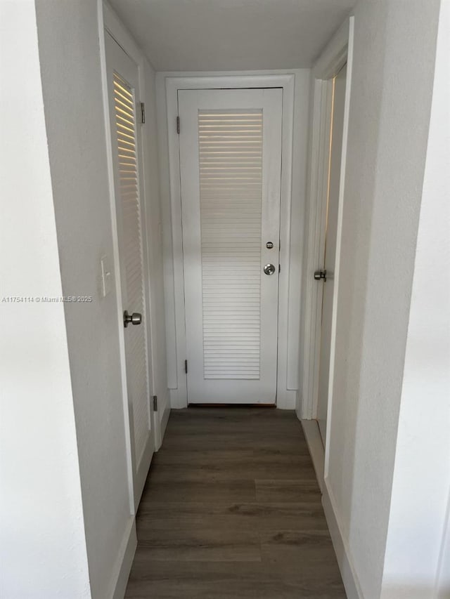 corridor with wood finished floors