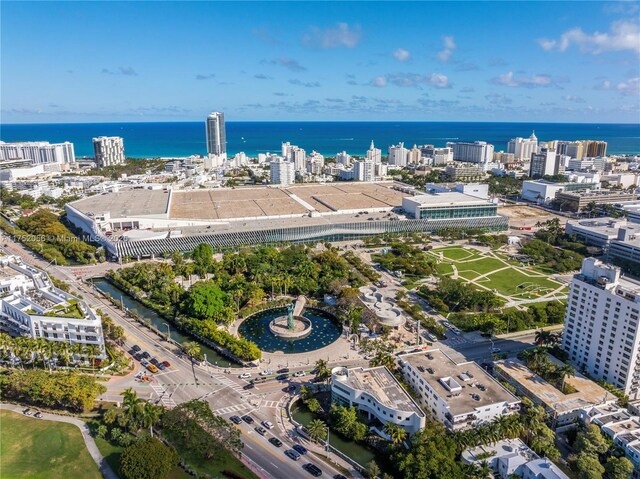 aerial view with a water view and a city view