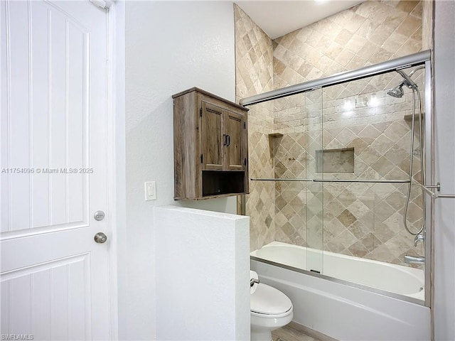 7684 County Rd 78, La Belle, FL 33935 - bathroom featuring toilet and combined bath / shower with glass door