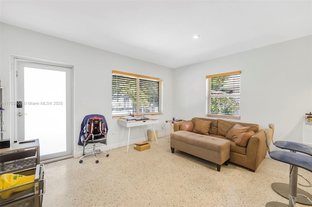 living room with recessed lighting