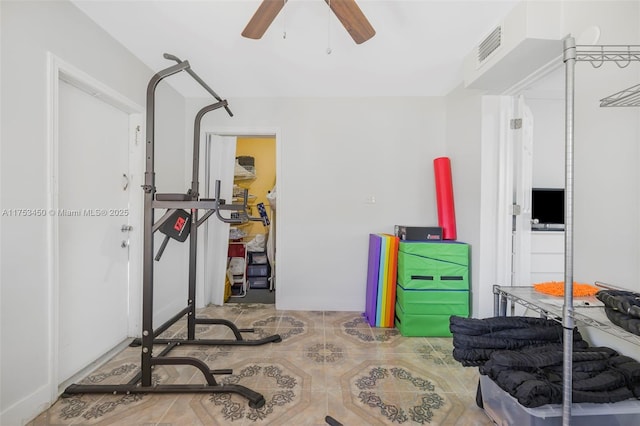 workout area featuring ceiling fan