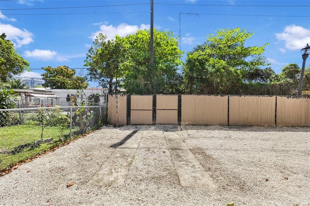 view of yard featuring a gate and fence