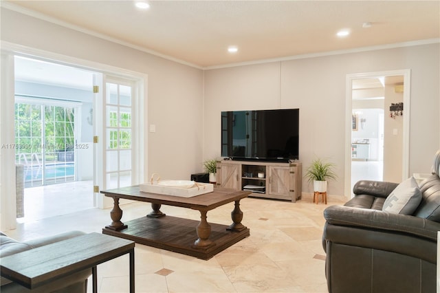 living room featuring recessed lighting and crown molding