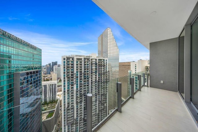 balcony featuring a view of city