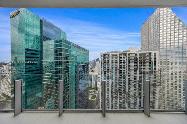 balcony featuring a city view