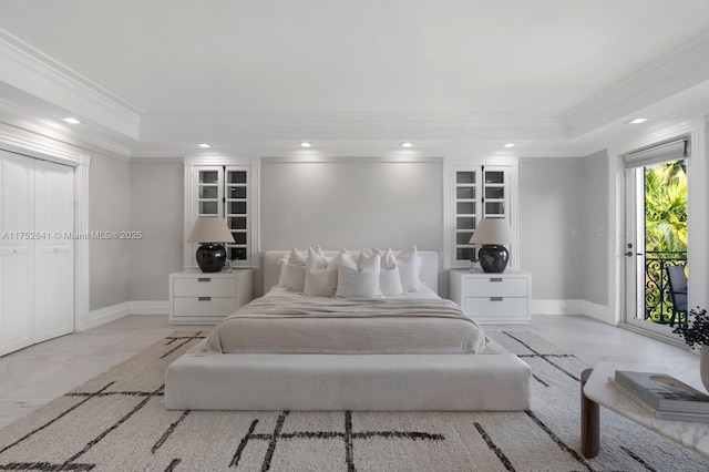 bedroom featuring a raised ceiling, crown molding, and baseboards