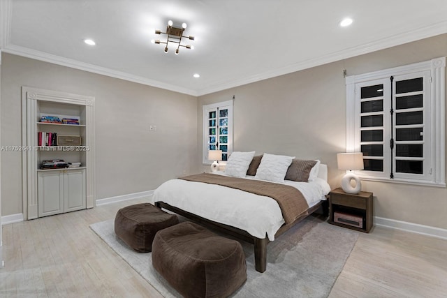 bedroom featuring ornamental molding, recessed lighting, wood finished floors, and baseboards