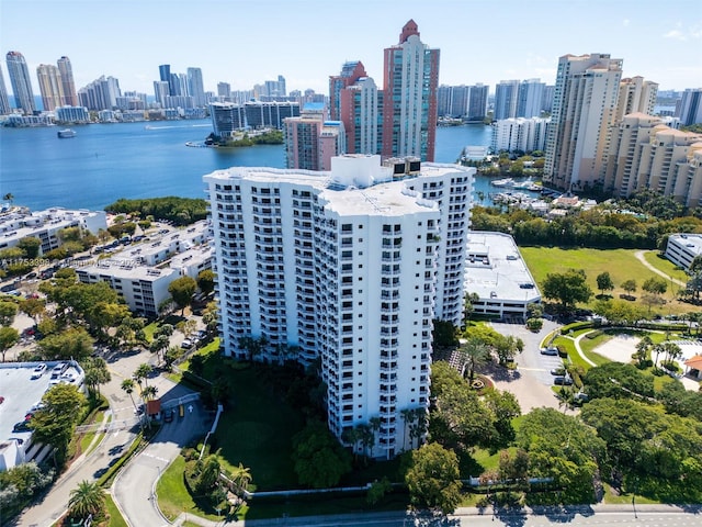 drone / aerial view with a view of city and a water view