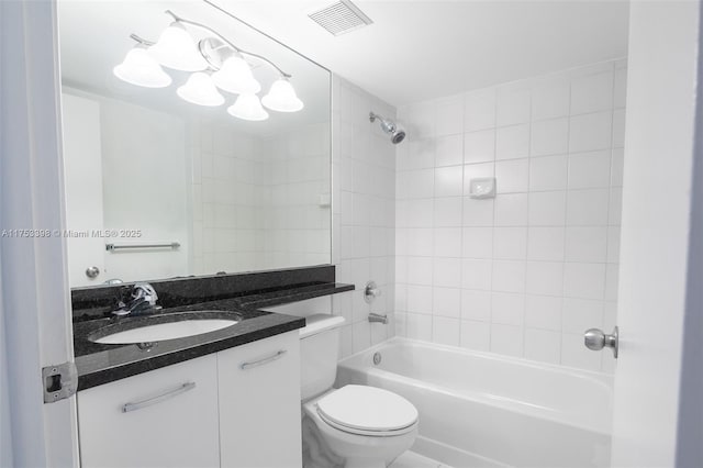 bathroom with toilet, bathtub / shower combination, visible vents, and vanity