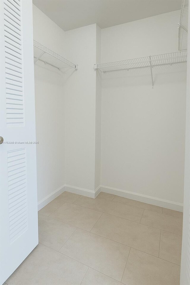 3300 NE 192nd St Unit 1908, Aventura, FL 33180 - spacious closet with light tile patterned floors