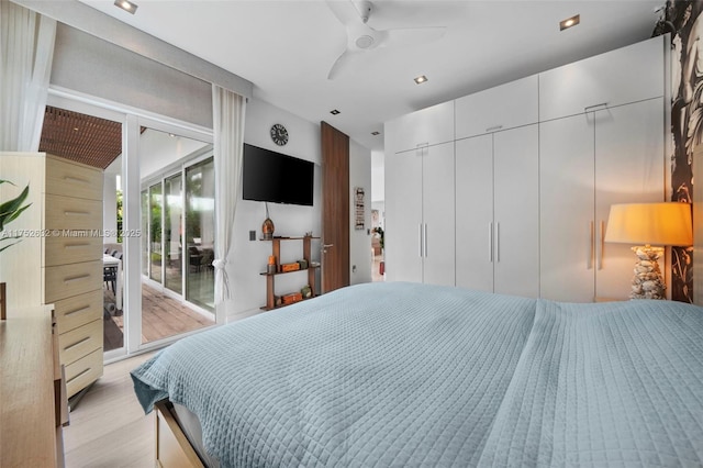 bedroom with access to exterior, light wood-style flooring, and ceiling fan