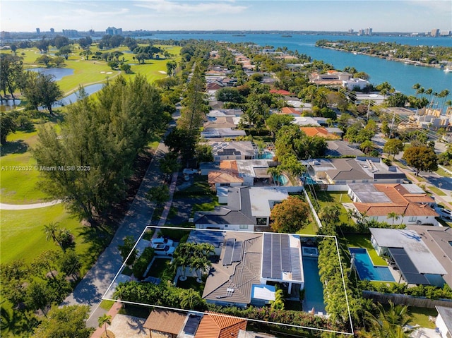 bird's eye view with a water view and a residential view