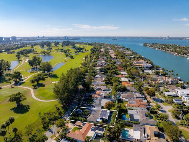 aerial view with a residential view and a water view