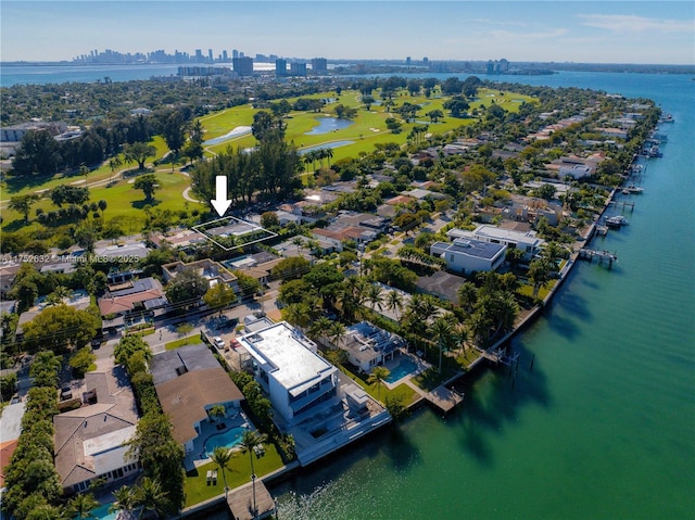 bird's eye view with a water view