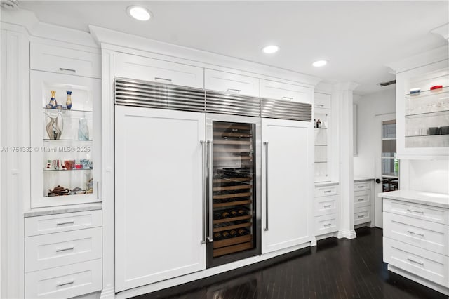 bar with wine cooler, dark wood-style flooring, and recessed lighting