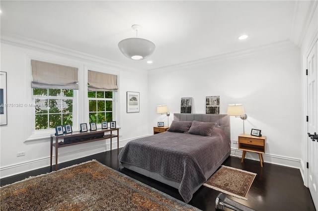 bedroom featuring ornamental molding, recessed lighting, baseboards, and wood finished floors