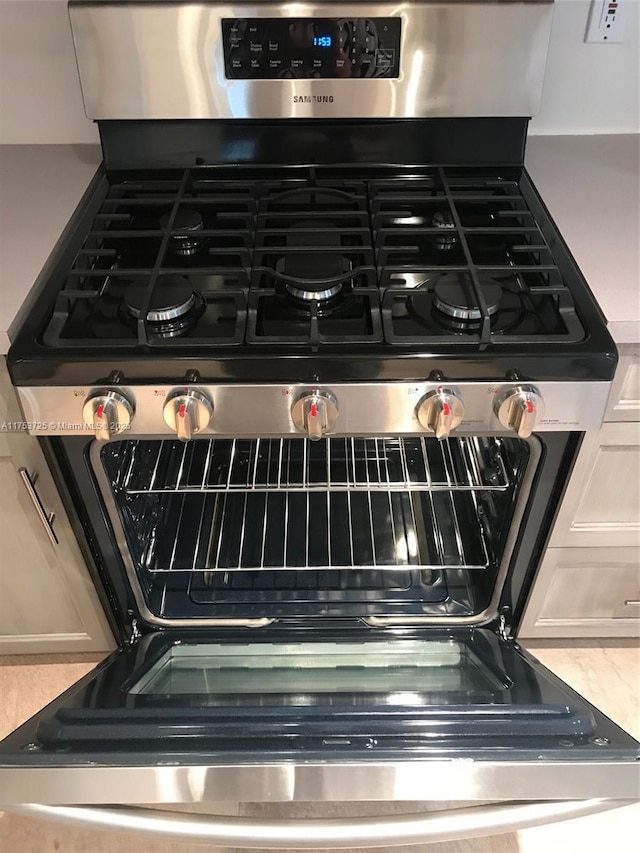 room details with stainless steel gas range oven