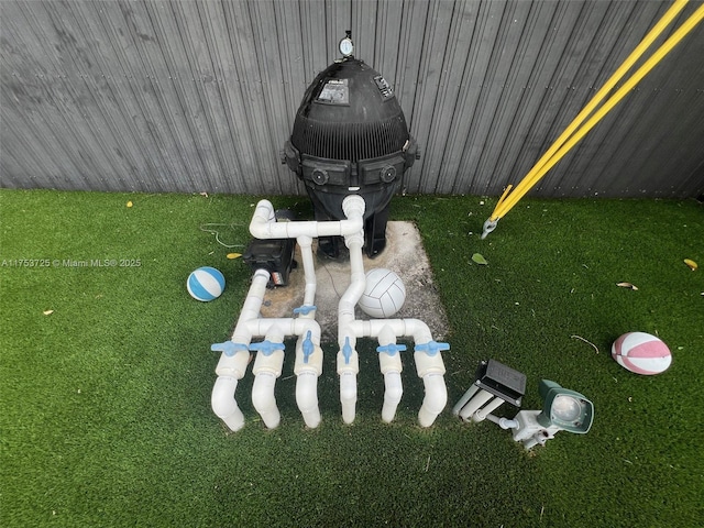 exterior details featuring pump