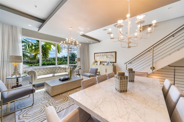 dining area with stairs, a chandelier, and recessed lighting