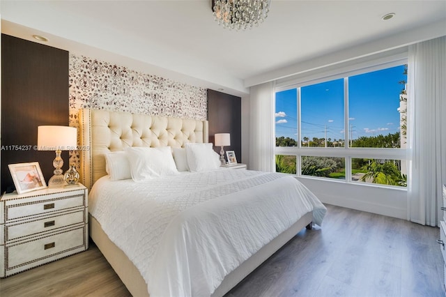 bedroom with wood finished floors