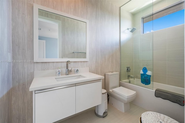 bathroom with tile patterned flooring, vanity, toilet, and bathing tub / shower combination