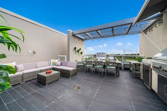 view of patio with exterior kitchen, an outdoor living space, and a pergola