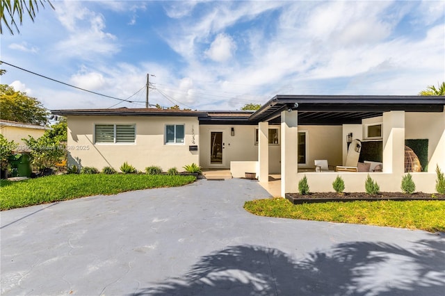 view of front of home with stucco siding