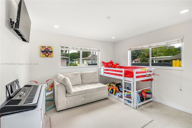 bedroom with recessed lighting and baseboards