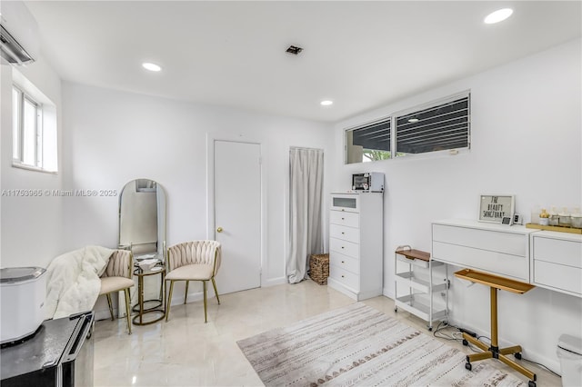 office with baseboards and recessed lighting