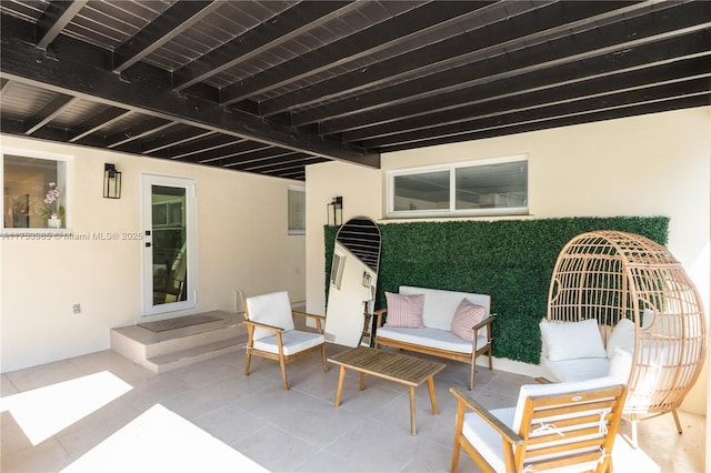 view of patio featuring entry steps and an outdoor hangout area