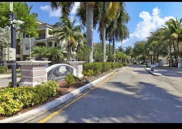 view of street featuring curbs