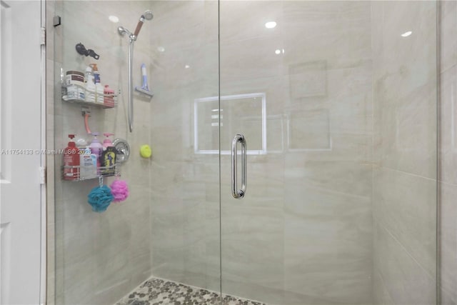 full bathroom with a shower stall