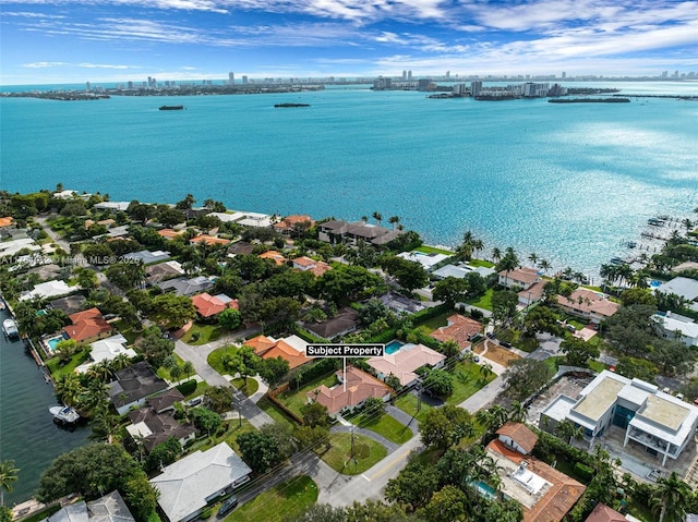 drone / aerial view with a water view