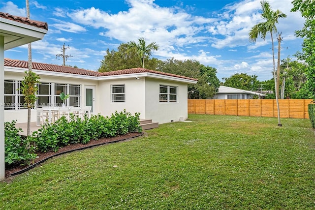 view of yard with fence