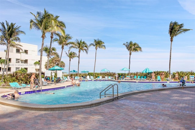 community pool with a patio