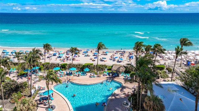 bird's eye view with a view of the beach and a water view