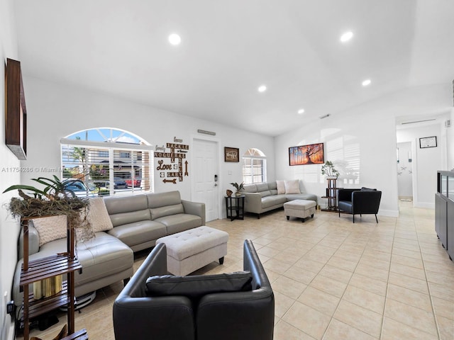 living area with lofted ceiling, light tile patterned floors, baseboards, and recessed lighting