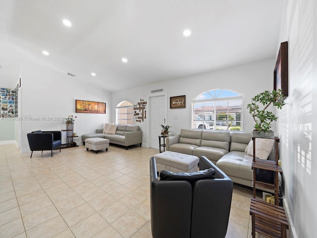 living area featuring recessed lighting, visible vents, light tile patterned flooring, vaulted ceiling, and baseboards