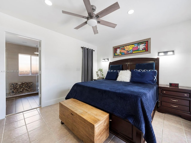 bedroom with baseboards, light tile patterned flooring, connected bathroom, and recessed lighting