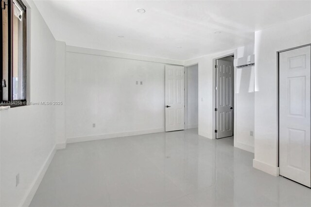 14799 SW 48th Ct, Miramar, FL 33027 - unfurnished room featuring finished concrete floors and baseboards